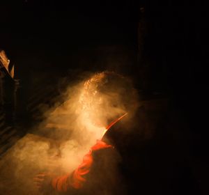 View of firework display at night