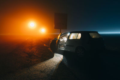 Car on street at night