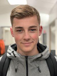 Close-up portrait of smiling young man