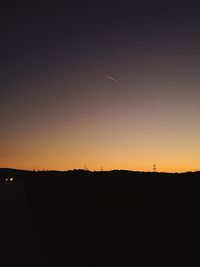 Silhouette of trees at sunset