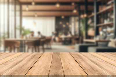 Close-up of wooden table at restaurant