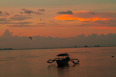 Fisherman boat in the sunset