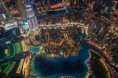 High angle view of illuminated buildings at night