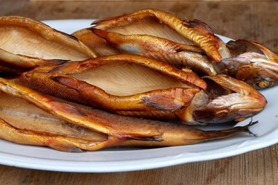 Close-up of cooked fish served in plate