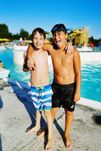 Full length of shirtless boy in swimming pool