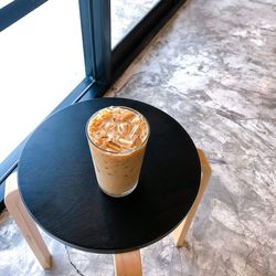 High angle view of coffee cup on table