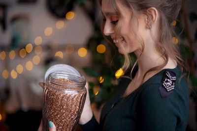 Girl with a can of buckwheat