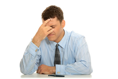 Man wearing mask against white background