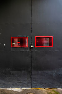 Red closed door of building