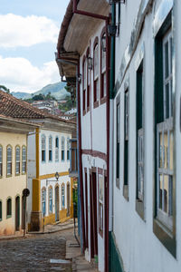 Alley amidst buildings in town