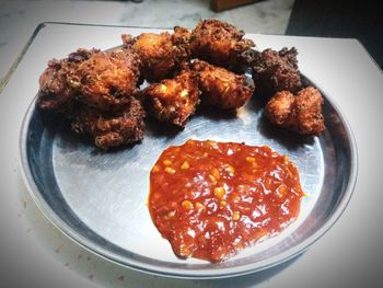 High angle view of meat in plate on table