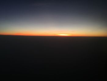 Scenic view of silhouette landscape against sky during sunset