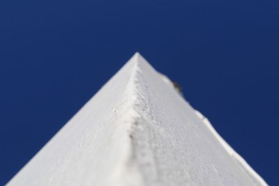 Low angle view of building against clear blue sky