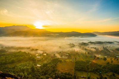 High angle view of landscape against sky during sunset