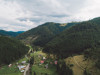 High angle view of trees on mountain against sky