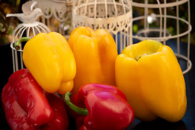 Close-up of yellow bell peppers for sale at market stall