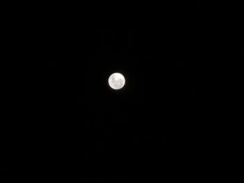 Scenic view of moon against clear sky at night