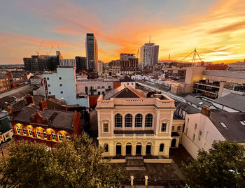 Cityscape against sky during sunset