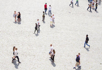 High angle view of people on footpath