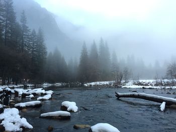 Scenic view of frozen lake against sky