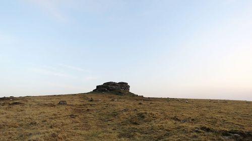 Scenic view of field against clear sky