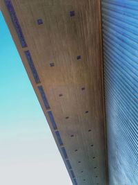 Low angle view of building against blue sky