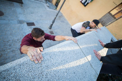 High angle view of men working in city