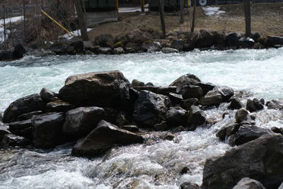 Water flowing through rocks at sea shore