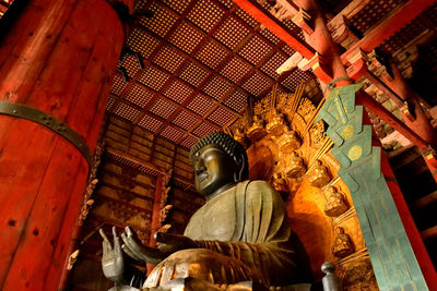 Low angle view of statue in temple building