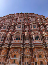 Low angle view of ornate building against sky