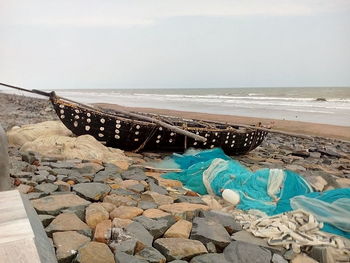 Scenic view of sea shore against sky