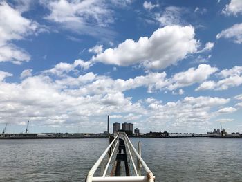 Bridge over river against sky