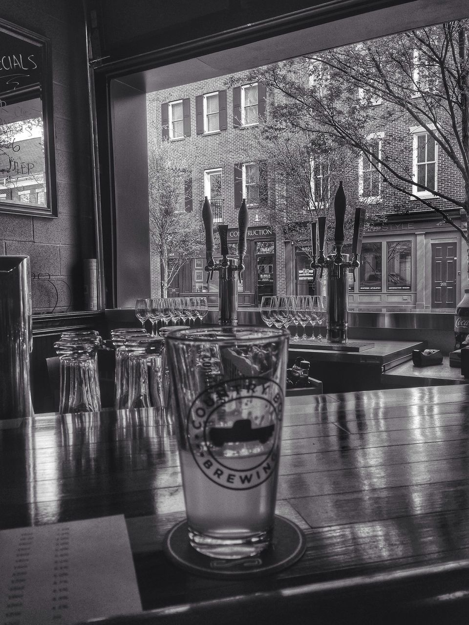 table, indoors, drink, food and drink, glass - material, window, drinking glass, refreshment, transparent, freshness, water, glass, restaurant, still life, built structure, day, architecture, no people, close-up, focus on foreground