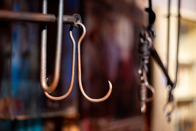 Close-up of clothes hanging on display at store