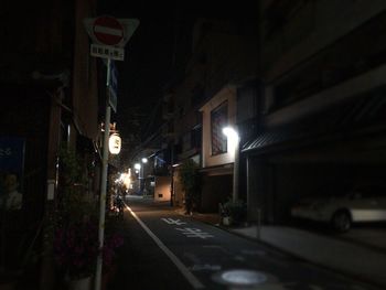 Illuminated street at night