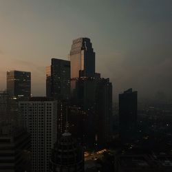 Modern buildings in city against sky