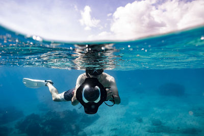 Man swimming in sea