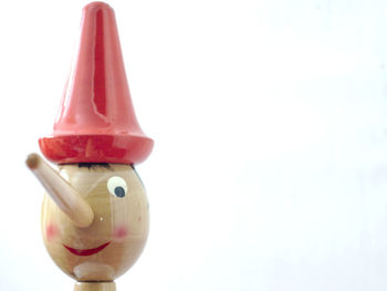 Close-up of toy against white background