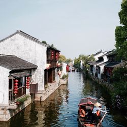 View of canal along buildings