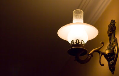 Low angle view of illuminated light bulb