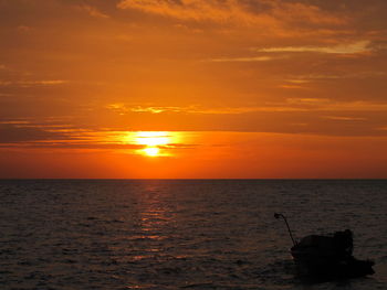 Scenic view of sunset over sea