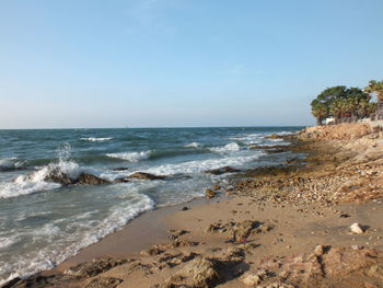 Scenic view of beach against sky