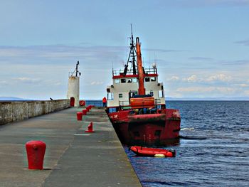 View of the pier on sea against sky