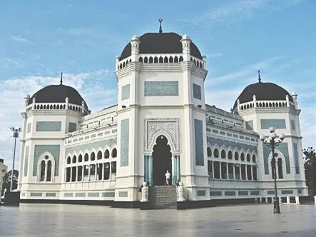 architecture, built structure, building exterior, dome, sky, men, rear view, lifestyles, walking, full length, cloud - sky, travel destinations, standing, facade, tourism, water, person, place of worship