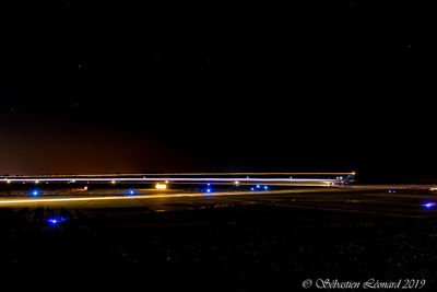 Light trails on road at night