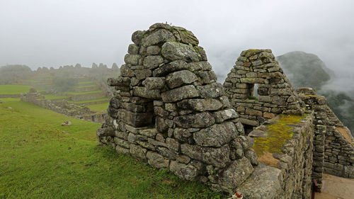 Ruins of temple against sky