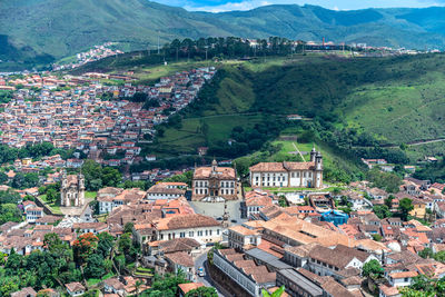 High angle view of townscape against mountain