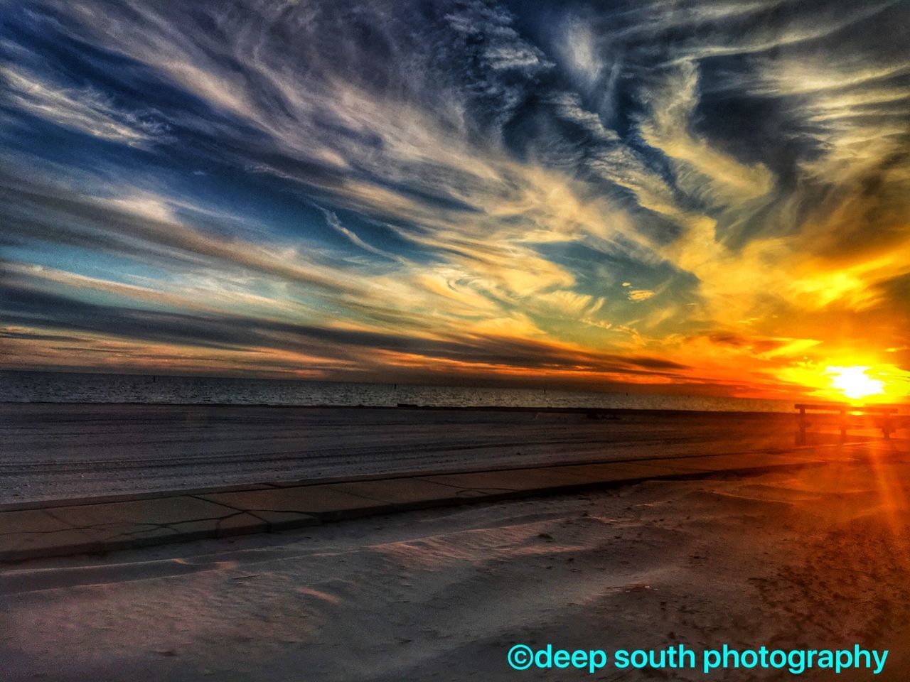 SCENIC VIEW OF SEA AGAINST SKY AT SUNSET