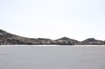 Scenic view of mountains against clear sky