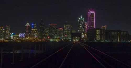 Illuminated cityscape at night